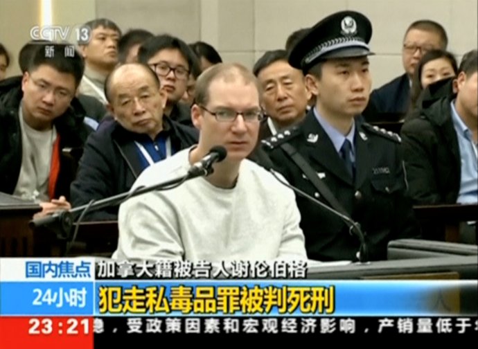 Robert Lloyd Schellenberg u soudu v Ta-lienu (14. ledna  2019, záběr z vysílání čínské státní televize). Foto: CCTV via Reuters