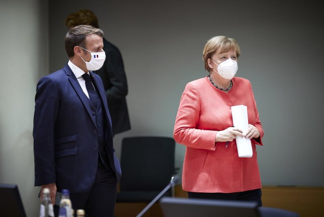 Francouzský prezident Emmanuel Macron a německá kancléřka Angela Merkelová na summitu lídrů Evropské unie. Foto: ČTK