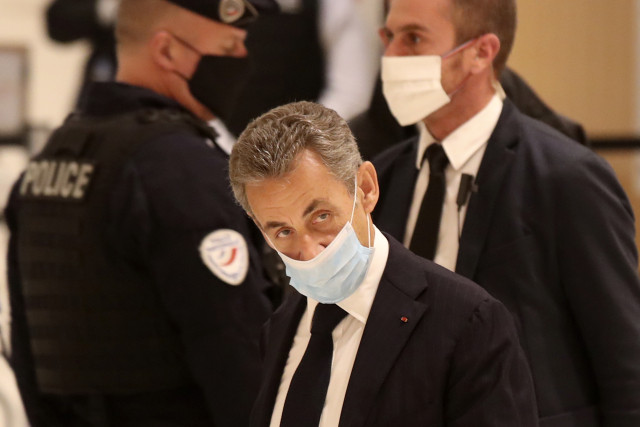 Nicolas Sarkozy přichází k soudu. Foto: Michel Euler, ČTK/AP