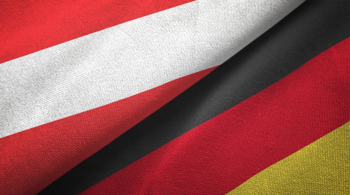Rakouská a německá vlajka. Foto: Adobe Stock