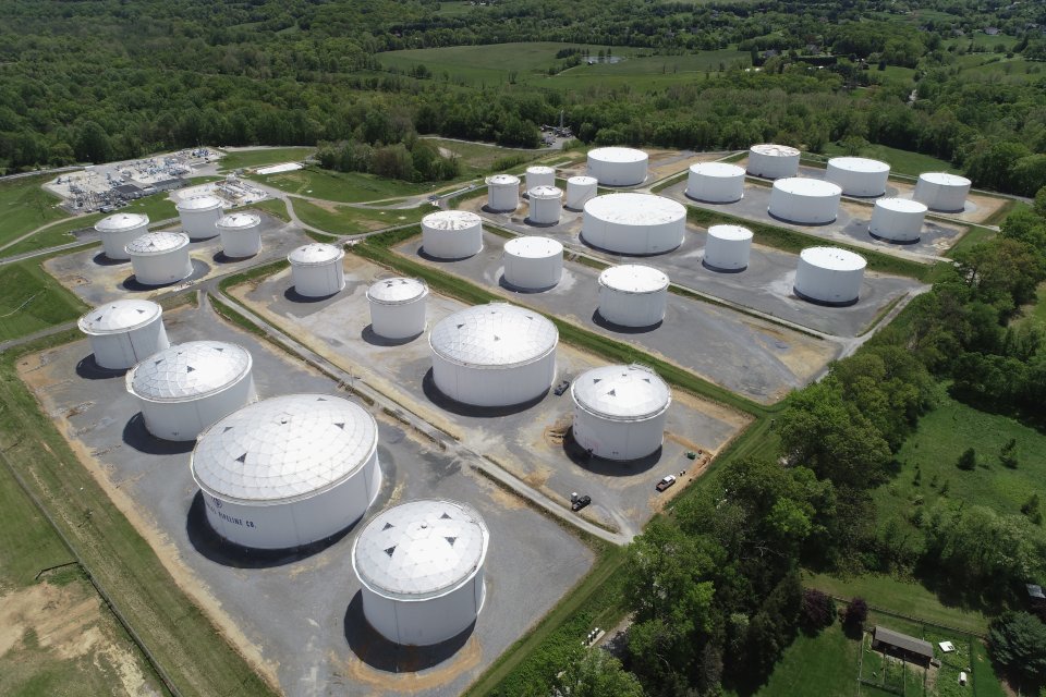 Holding tanks are seen in an aerial photograph at Colonial Pipeline's Dorsey Junction Station in Woodbine, Maryland, U.S. May 10, 2021. REUTERS/Drone Base