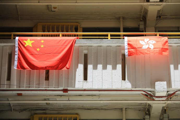 Přesně před pětadvaceti lety Británie navrátila svou tehdejší kolonii Hongkong Číně. Od té doby je území spravováno podle formule „jedna země, dva systémy". Foto: AdobeStock, Lewis Tse Pui Lung