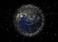 Umělecké ztvárnění vesmírného odpadu v okolí Země. Znázorněný vesmírný odpad je větší než ve skutečnosti. Zdroj: ESA
